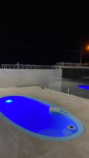 Casa amarela cantinho de lazer